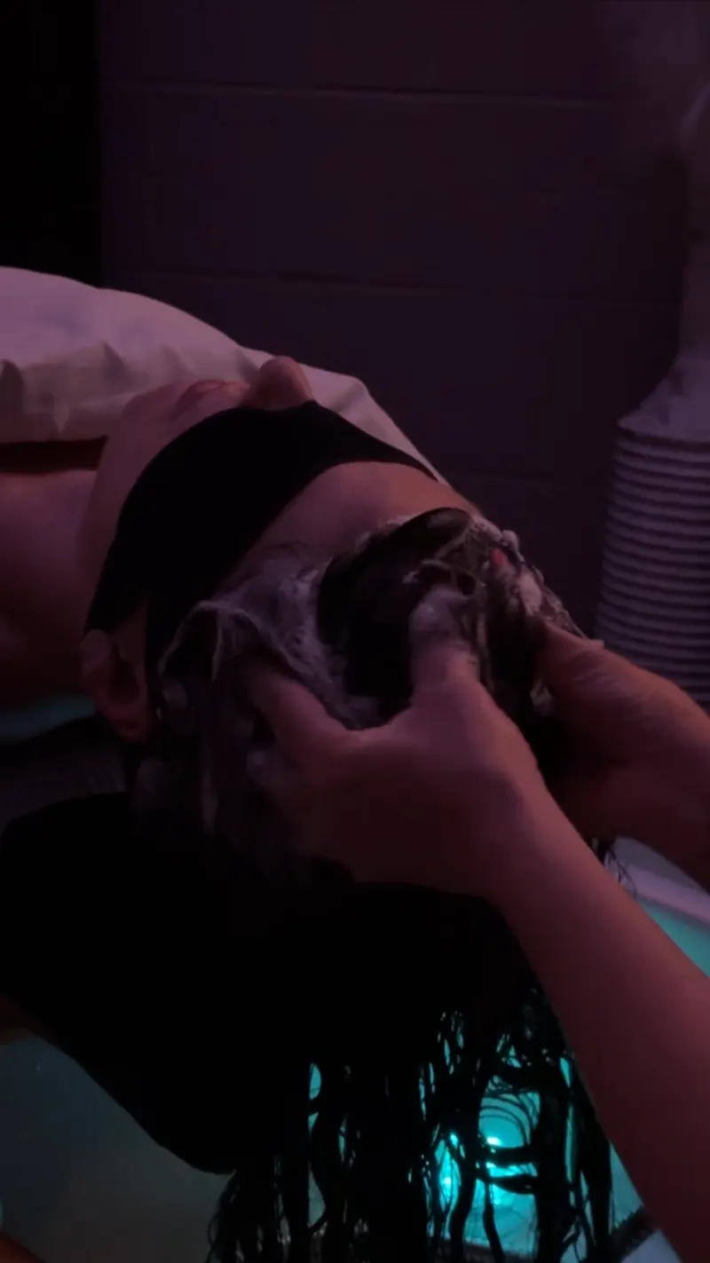 Hand massage during scalp cleanse